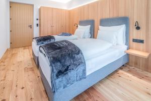 Ένα ή περισσότερα κρεβάτια σε δωμάτιο στο Chalet & Appartement Zingerlehof Trens