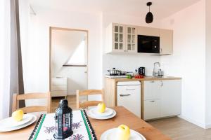 Kuchyňa alebo kuchynka v ubytovaní Dom Pod Gubałówką - Zakopane Apartamenty