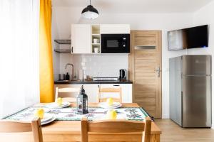 Kuchyňa alebo kuchynka v ubytovaní Dom Pod Gubałówką - Zakopane Apartamenty