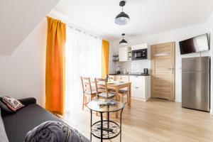 Kuchyňa alebo kuchynka v ubytovaní Dom Pod Gubałówką - Zakopane Apartamenty