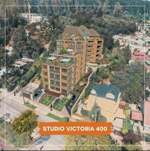 an aerial view of a building in a city at Studio Victoria 400 in Concepción