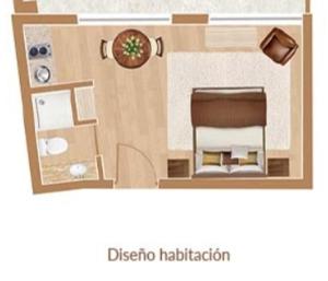 a floor plan of a room with a chair at Studio Victoria 400 in Concepción