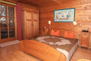 Кровать или кровати в номере Ferienwohnung Sternschnuppe