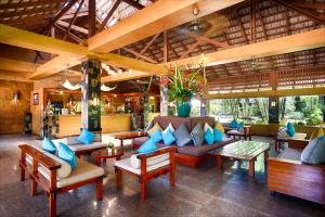 a living room filled with lots of furniture at Phuket Island View - SHA Extra Plus in Karon Beach