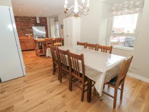 a dining room with a table and chairs at The Bield in Eyemouth