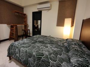 Postel nebo postele na pokoji v ubytování Lin's B&B