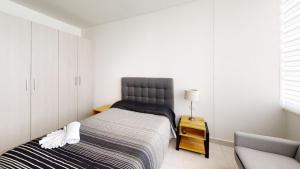 Кровать или кровати в номере Beautiful Apartment at Carso Residential with Pool