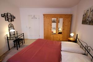 Ein Bett oder Betten in einem Zimmer der Unterkunft Haus Anna by Rujana