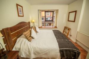 Postel nebo postele na pokoji v ubytování Hotel del Volcán