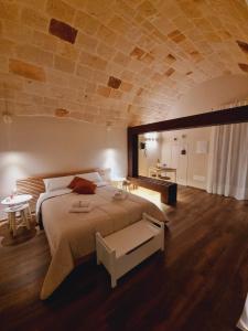 Katil atau katil-katil dalam bilik di La Casupola