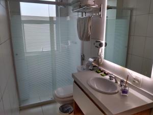 Um banheiro em Hotel Global Grupos