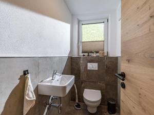 Kúpeľňa v ubytovaní Ferienhaus zur Biene