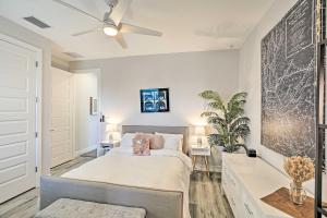 a bedroom with a bed and a chalkboard wall at Sun-Seekers Getaway Lavish Cape Coral Villa in Cape Coral +24 photos