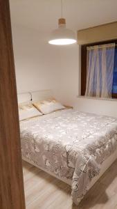 Cabanaira appartamentoにあるベッド