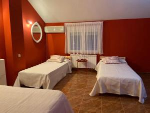 A bed or beds in a room at El Abigero II Még 35 kép