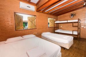 Postel nebo postele na pokoji v ubytování Green Haven Hostel