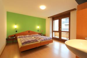 Llit o llits en una habitació de Ferienhaus-Apartment Golf