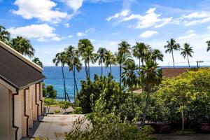 a view of the ocean from a house at Kailua Village#307 in Kailua-Kona