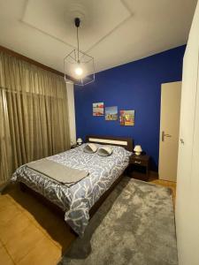Postel nebo postele na pokoji v ubytování Karras' Home
