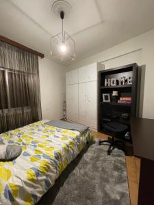 Postel nebo postele na pokoji v ubytování Karras' Home
