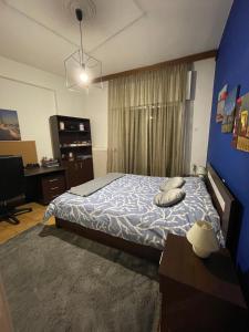 Postel nebo postele na pokoji v ubytování Karras' Home