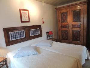 Postel nebo postele na pokoji v ubytování Gîte La Glycine