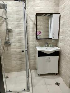 Koupelna v ubytování Sea view apartments Orbi Beach Tower красивые виды с балконов