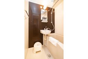 a small bathroom with a sink and a toilet at Apartment Sun Bright - Vacation STAY 89260v in Tokyo