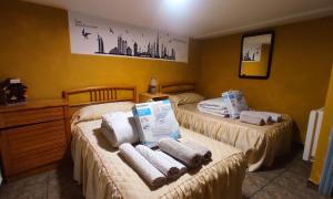 A bed or beds in a room at Casa Terzia a 10 min de Logroño