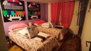 A bed or beds in a room at Casa Terzia a 10 min de Logroño