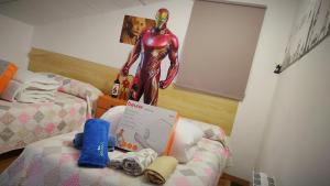A bed or beds in a room at Casa Terzia a 10 min de Logroño
