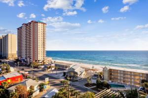 a view of the beach and buildings and the ocean at Origin at Seahaven #831 by Book That Condo in Panama City Beach