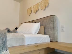 Postel nebo postele na pokoji v ubytování Boho katoikia
