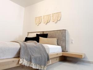 Postel nebo postele na pokoji v ubytování Boho katoikia