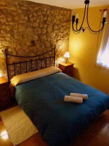 Katil atau katil-katil dalam bilik di La Caseta Del Forn (Penyagolosa)