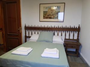 En eller flere senger på et rom på Casa Martín