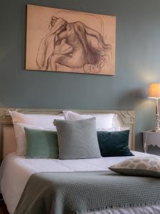 Clos Saint Martin客房内的一张或多张床位