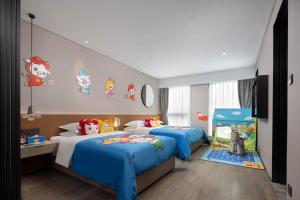 Postel nebo postele na pokoji v ubytování Leeden Hotel Hangzhou