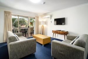 TV a/nebo společenská místnost v ubytování Turtle Beach Resort