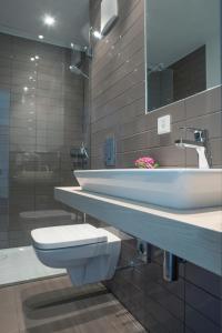 Koupelna v ubytování Hotel Die Alm