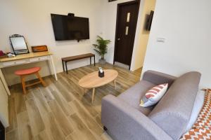 TV i/ili multimedijalni sistem u objektu Full house