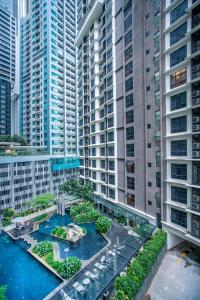 an aerial view of a city with tall buildings at 188 Suites KLCC by CoBNB in Kuala Lumpur