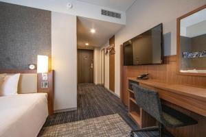 TV a/nebo společenská místnost v ubytování ibis Styles Tokyo Ginza