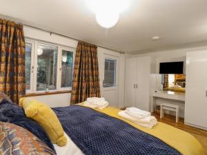 Voodi või voodid majutusasutuse Orchard View Lodge toas