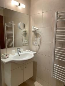 Koupelna v ubytování W1 Haus Ganghofer + 21 fotografií