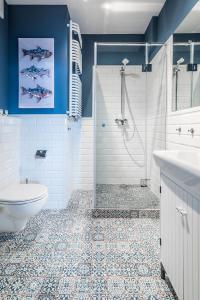 Kúpeľňa v ubytovaní Triton Park Apartments + 37 fotografií