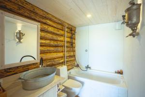 Koupelna v ubytování Mesi Tare Guesthouse + 39 fotografií