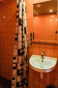 Koupelna v ubytování Braavo Spa Hotel