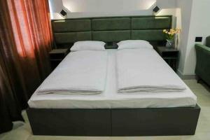 Postel nebo postele na pokoji v ubytování Апарт-отель Nine Rooms