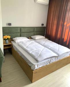 Postel nebo postele na pokoji v ubytování Апарт-отель Nine Rooms